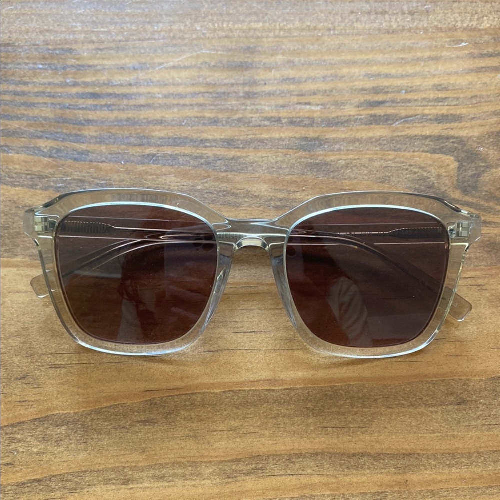 Saint Laurent Sunglasses. Clear frame with brown lenses. Comes with case.